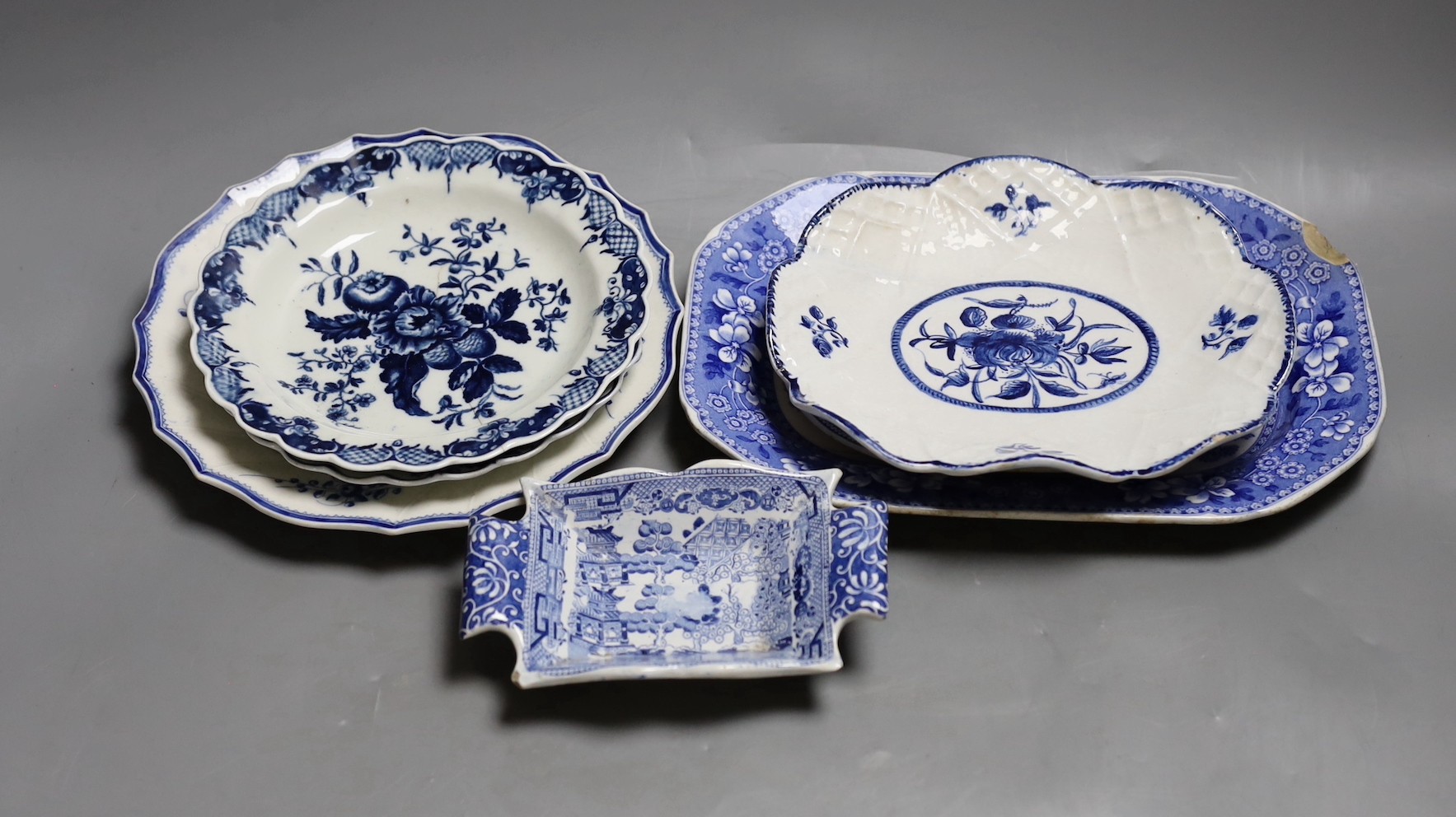 A Bow blue and white dish, 19.5cm, three Worcester blue and white plates, late 18th century and three 19th century blue and white pottery dishes